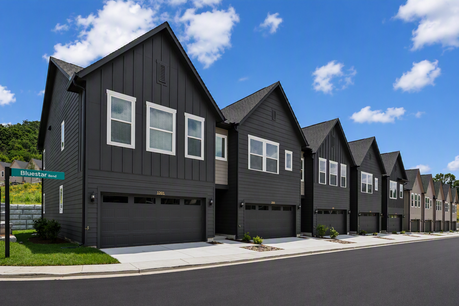 Luxury townhome residences with private 2-car garages and contemporary exterior design at HARMON West Meade.